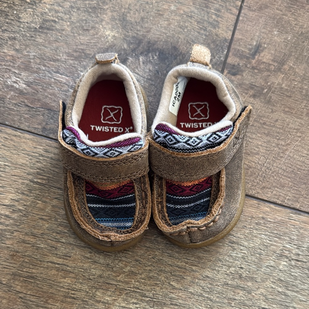 baby twisted X shoes